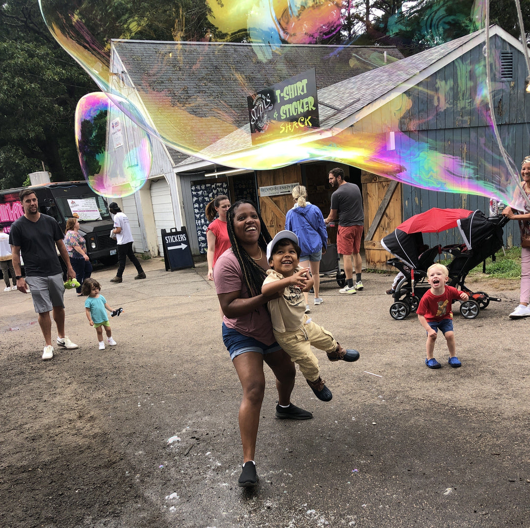 The Best Outdoor Activities for Kids This Summer (And Why Giant Bubbles Top the List)