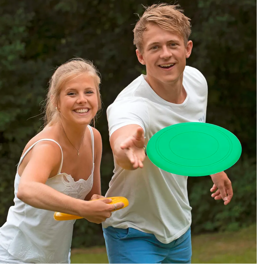 kids playing with bubble popper frisbee outdoor toy